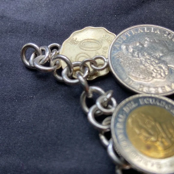 925 sterling silver coin charm bracelet 11 of them on here milor bracelet